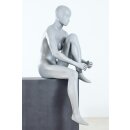 Mannequin woman without face - arms on the back
